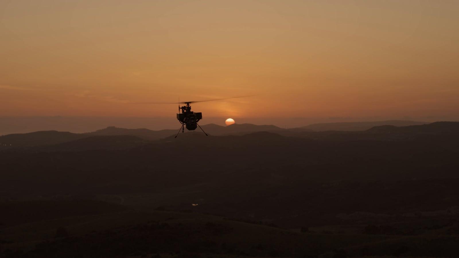 Ghost-X hovering above a ridgeline