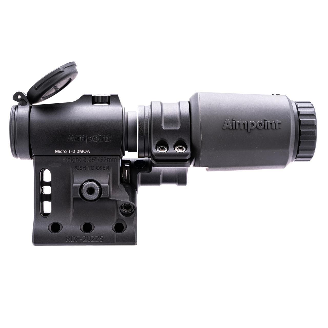 Black Aimpoint Micro T-2 red dot sight with 3X-P magnifier behind it on a Spuhr mount, side view